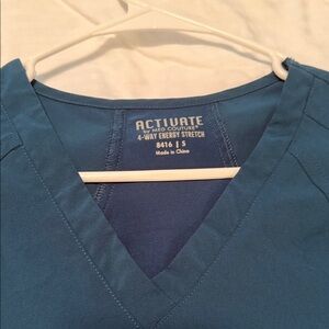 Med Couture Activate Women's Teal V-Neck Top